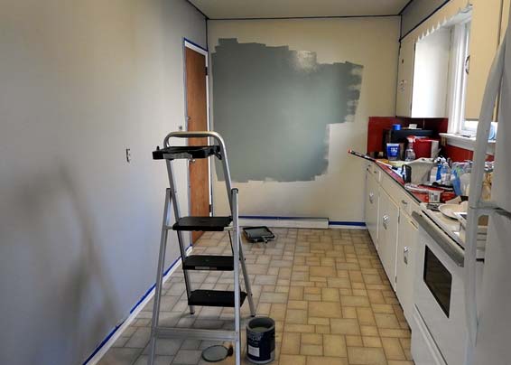 Photo of kitchen getting painted
