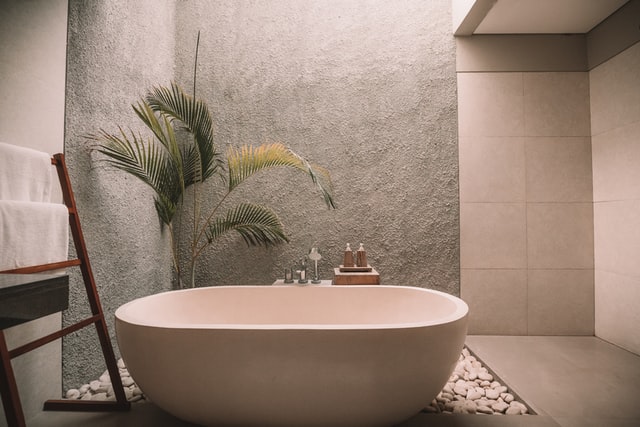 Photo of a serene bathroom with a standalone tub
