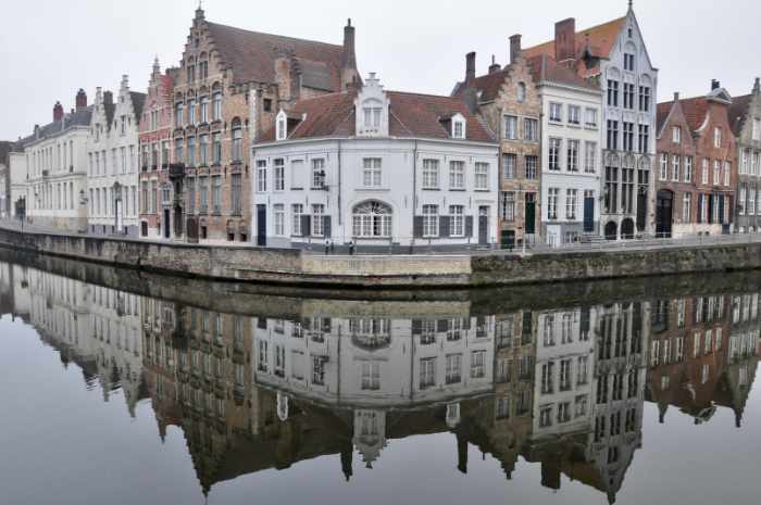 Photo of homes on a canal in a European town