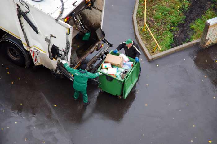 Photo of a garbage truck coming for a pickup