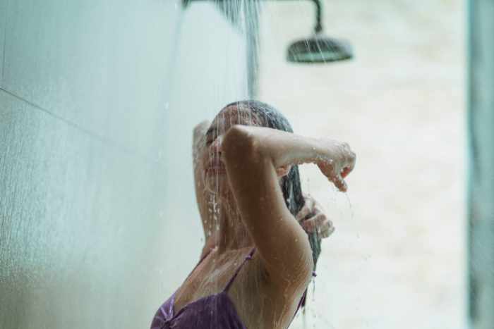 Photo of a woman taking a shower