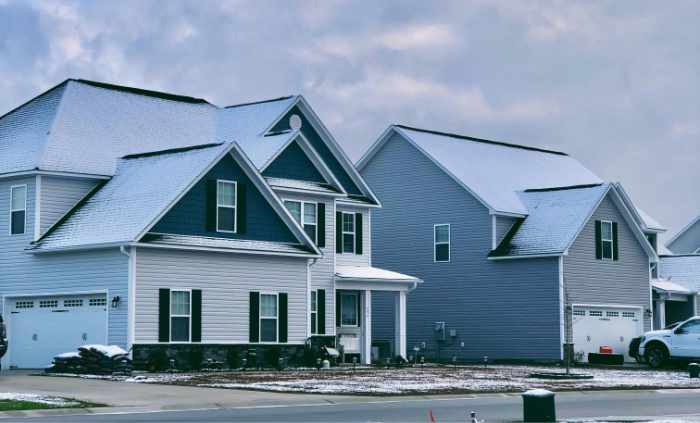 Photo of homes in winter with snow - Guide to Winter Weather Risks: Don't Slip and Fall 