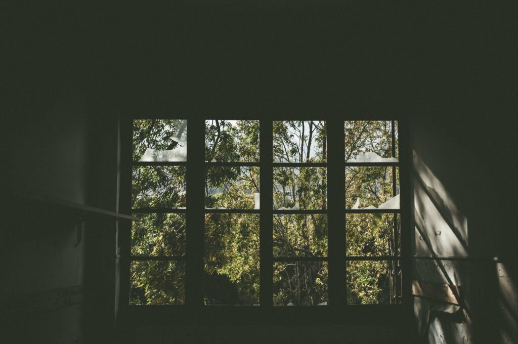 Photo of a large window in a dining room - Less Critical vs Urgent Home Repairs: Knowing What Needs Immediate Attention