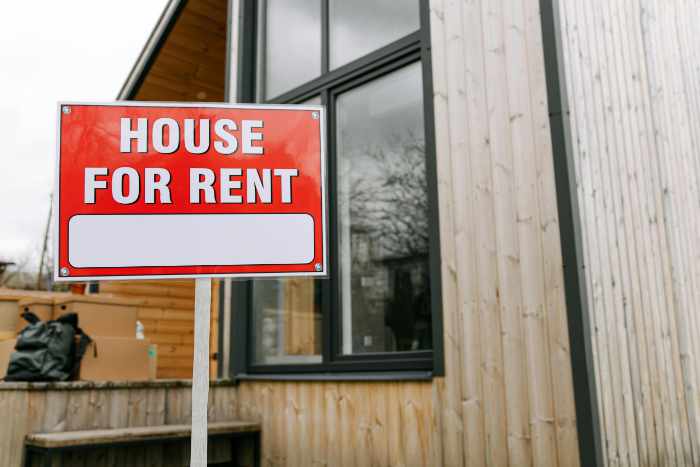 Photo of a home with a house for rent sign in front - 9 Tips to Make Your Property Appeal to Better Tenants